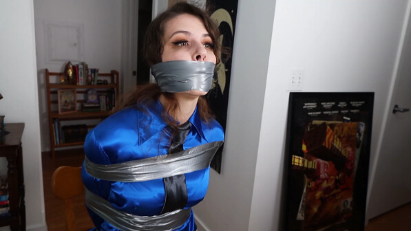 Mina Salome in sexy blue satin blouse and latex skirt gets tightly wraparound tape gagged and tied to a chair!
