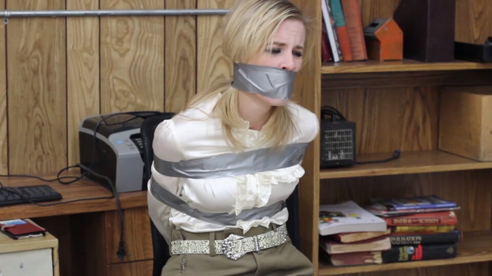 Catie Parker, wealthy equestrian star is tied and gagged waiting for the ransom to be paid