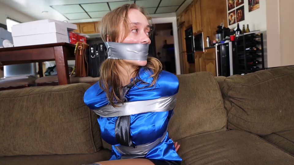 Jade Rose needs to be tightly tied up and wraparound tape gagged to fake a robbery that will save her from being fired