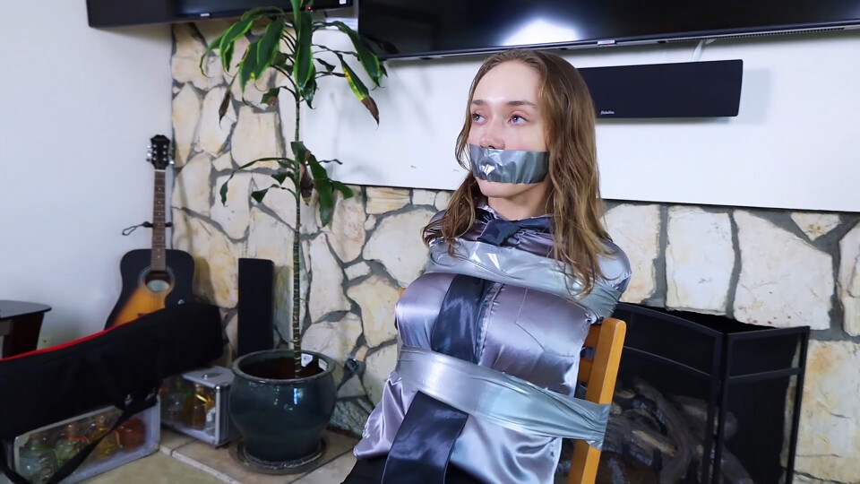 Jade Rose as the Agent Silverstone: Trapped in the enemy's lair, tightly taped up to a chair and gagged without hope of escape!