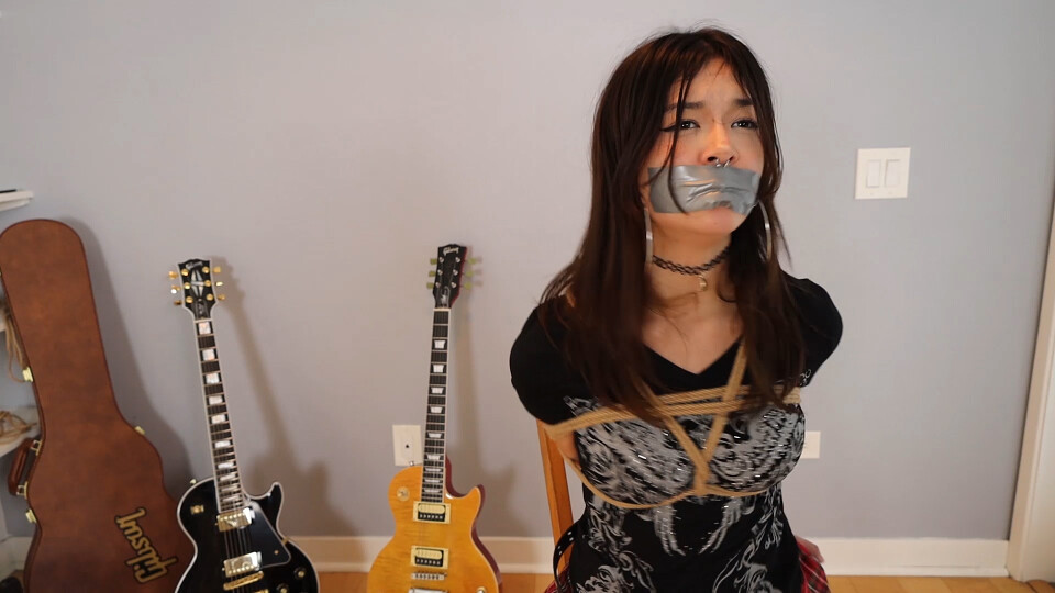 Kali a 19 years old emo student gets tied and gagged by a school professor after she finds out his dirty business