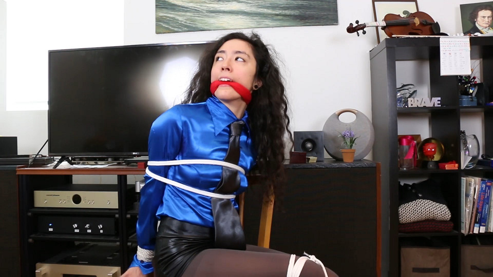 Khrystal is a businesswoman tied and gagged during the robbery of corporative secrets!